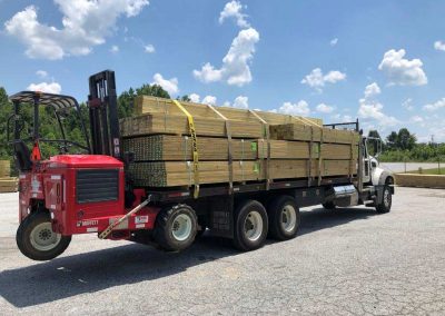 lumber truck on the way with a new load